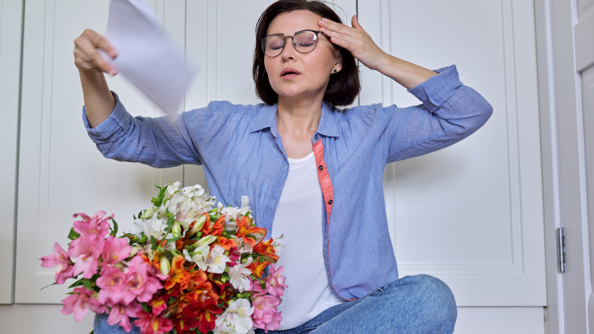 woman with menopause experiencing hot flashes