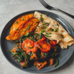 Roast sweet potatoes, omelette and spinach in tomato sauce